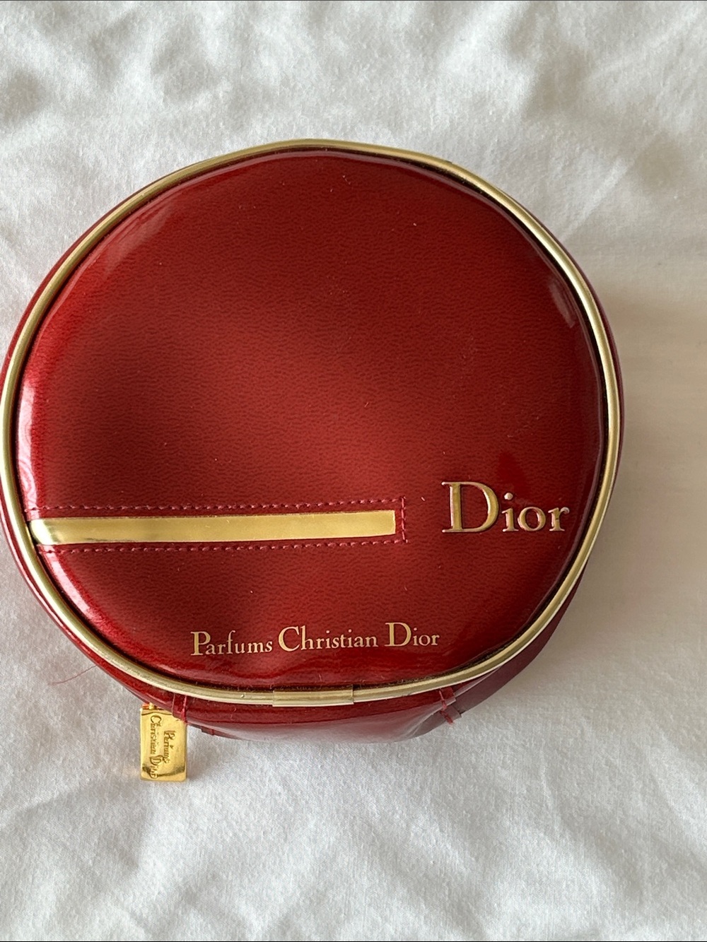 Vintage 90’s Y2K Christian Dior Round Red Cosmetic Case with Gold Accents.